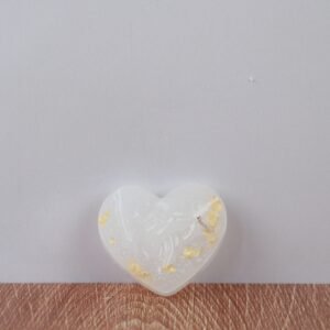 Corazon con manos pequeñas