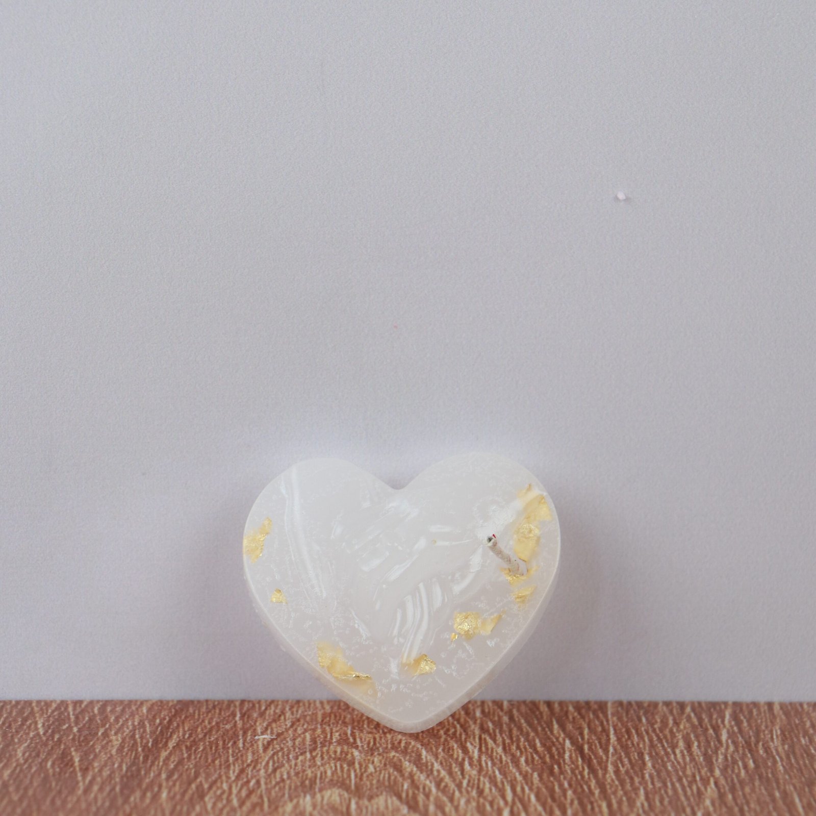 Corazon con manos pequeñas